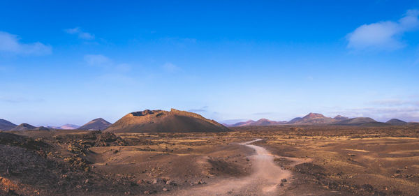 Scenic view of desert against sky