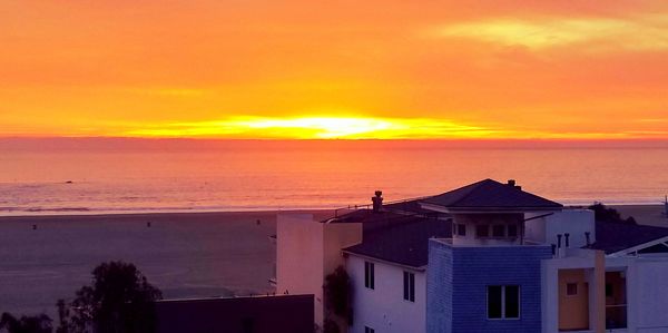 Scenic view of sea at sunset