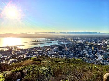 Cityscape against bright sky