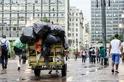 Man with umbrella in city