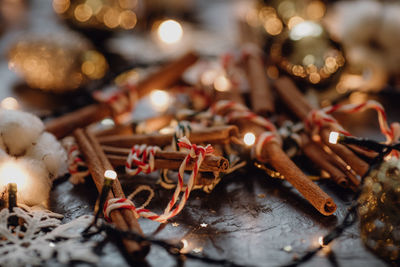 Close-up of christmas lights on wood