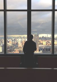 View of cityscape through window