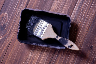 High angle view of paintbrush on table