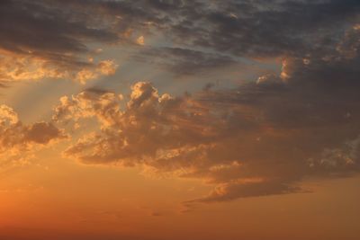 Low angle view of dramatic sky during sunset