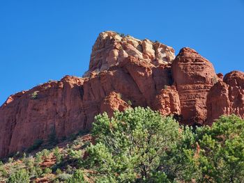 Rock formations against blue sky