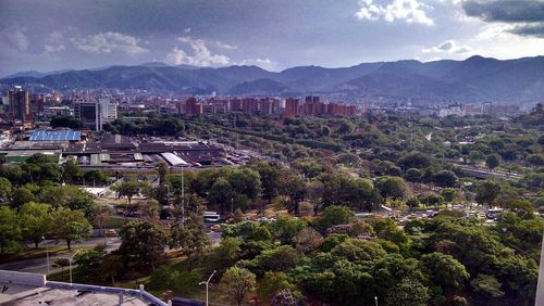 Aerial view of cityscape against sky