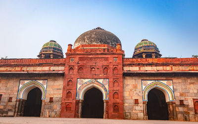 Mosque and tomb of isa khan of humayun tomb exterior view at misty morning from unique perspective