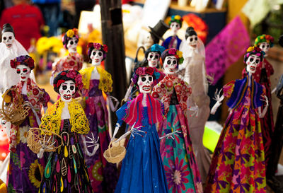 Multi colored figurines in market for sale
