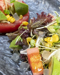 Close-up of chopped vegetables in plate