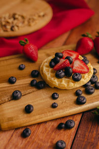 High angle view of strawberries on table