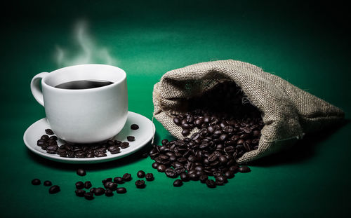 Close-up of coffee cup on table