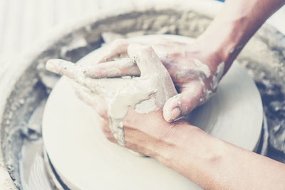 Close-up of person preparing food