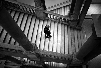Low angle view of man on staircase