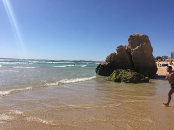 Scenic view of sea against clear sky