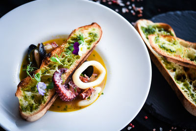 High angle view of fruit salad in plate on table