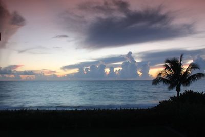 Scenic view of sea against sky at sunset