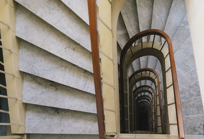 Low angle view of spiral staircase in building