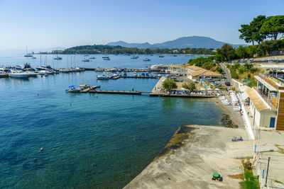 High angle view of boats moored at harbor