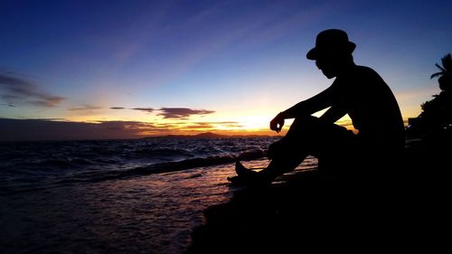 Scenic view of sea at sunset