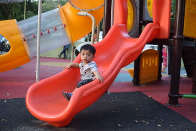 Boy playing in playground