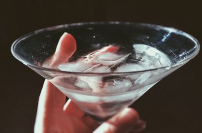 Close-up of hand holding cocktail