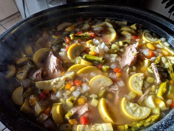 High angle view of meat in cooking pan