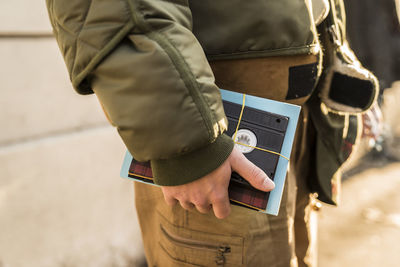 Close-up of man holding camera