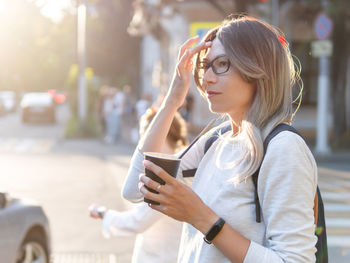 Young woman using mobile phone