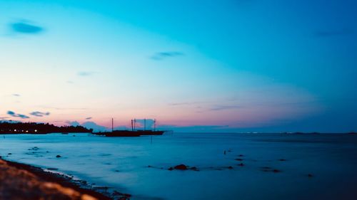 Scenic view of sea against sky at sunset