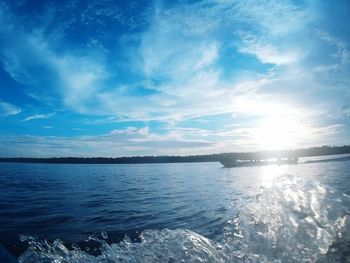 Scenic view of sea against blue sky