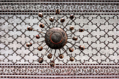 Directly below shot of chandelier on ceiling