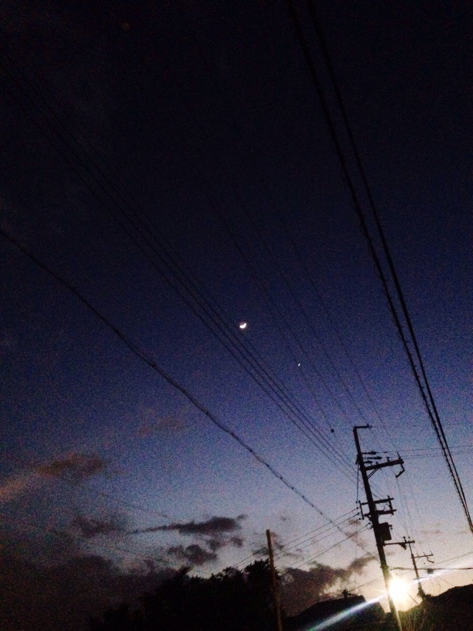 power line, low angle view, electricity, electricity pylon, power supply, fuel and power generation, silhouette, sky, connection, technology, cable, dusk, nature, beauty in nature, outdoors, vapor trail, cloud - sky, no people, power cable, scenics