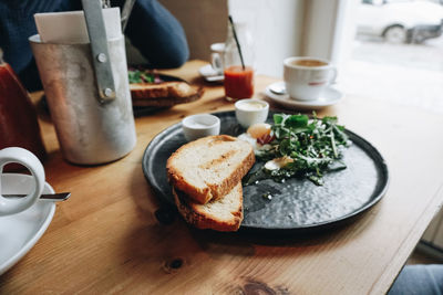 Close-up of breakfast served on table