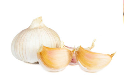 Close-up of garlic against white background