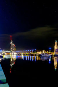 Illuminated buildings in city at night