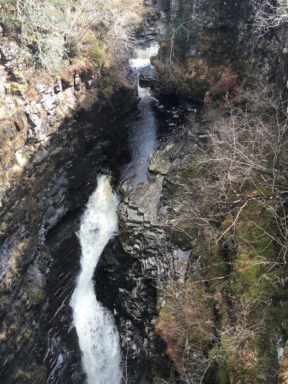 CLOSE-UP OF WATER IN BLURRED MOTION OF MAN