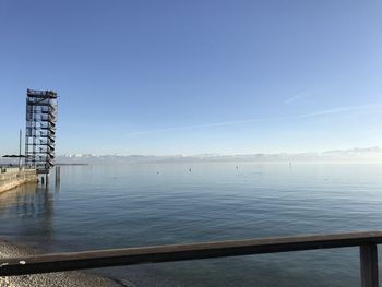 Scenic view of bay against clear sky