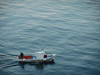 High angle view of man in boat on sea