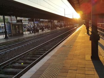 Railroad station platform during sunny day