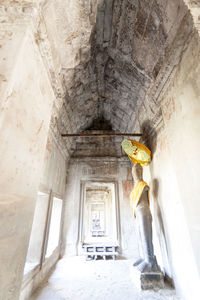 Low angle view of statues in old building