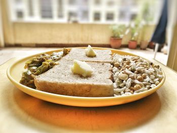 Close-up of bread in plate on table