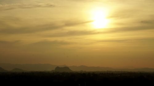 Scenic view of silhouette landscape against sky during sunset