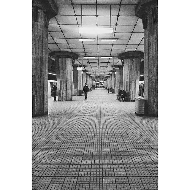 indoors, the way forward, architecture, built structure, corridor, diminishing perspective, transfer print, empty, ceiling, in a row, vanishing point, flooring, lighting equipment, auto post production filter, incidental people, tiled floor, architectural column, illuminated, absence, long
