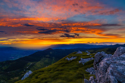 Scenic view of dramatic sky during sunset