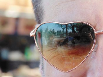 Close-up of woman wearing sunglasses