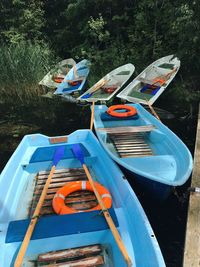 High angle view of boats moored on lake