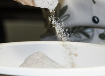 Close-up of water falling in bathroom at home