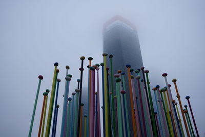 Low angle view of chess pieces against clear sky