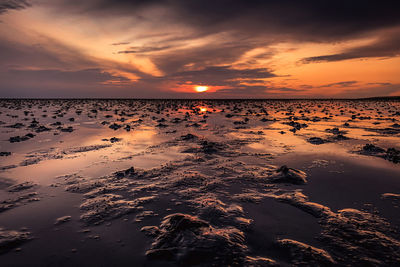 Scenic view of sea against sky during sunset