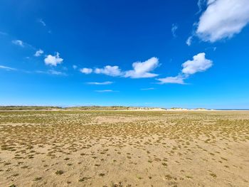 Scenic view of desert against sky